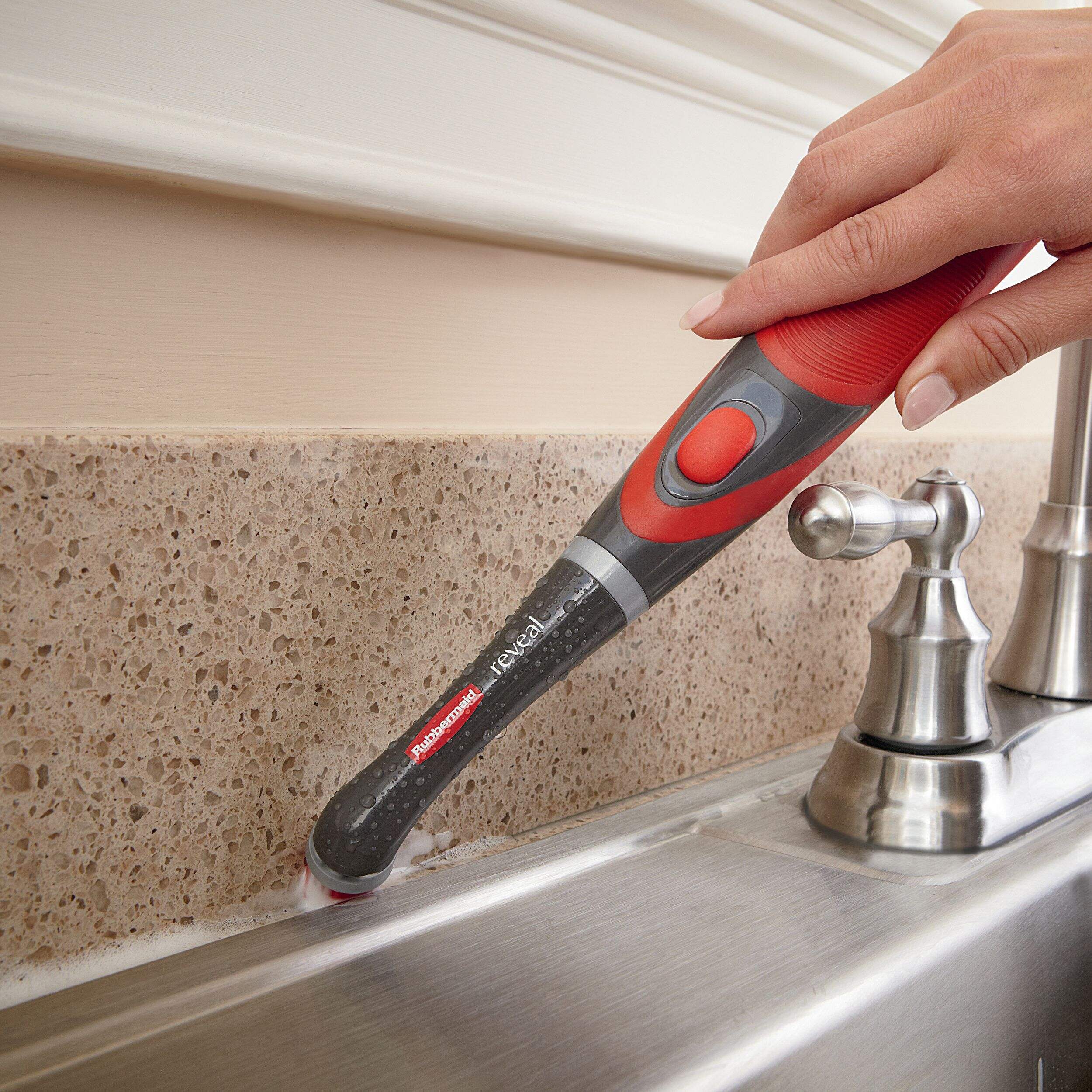 Rubbermaid Reveal powered scrubber cleaning a narrow household surface
